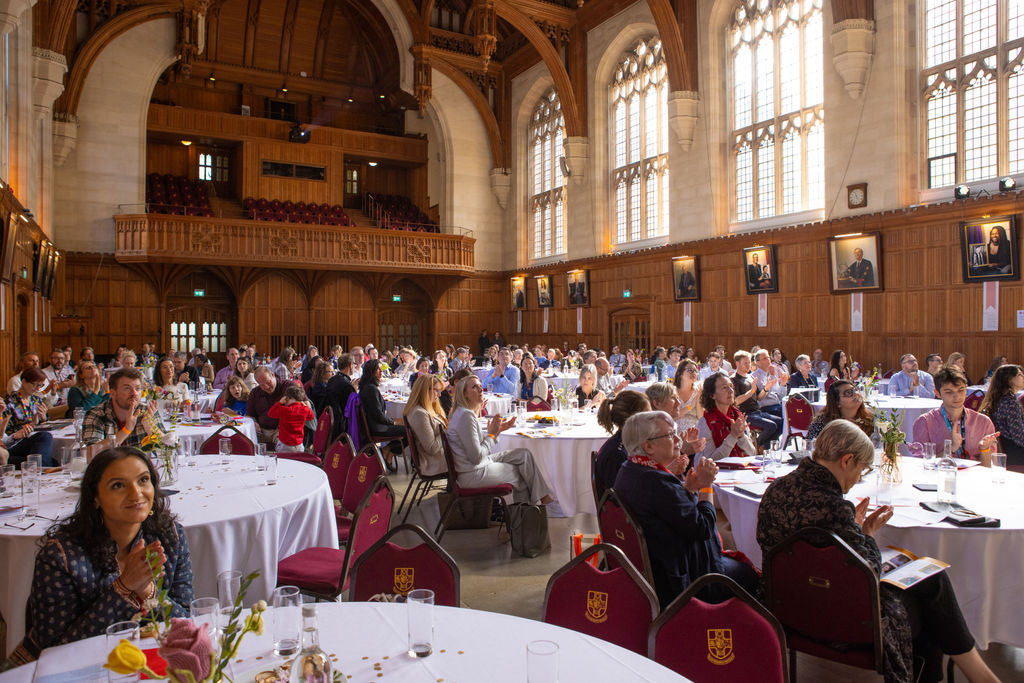 People celebrating the nominees and winners of the Bristol Teaching Awards 2024, at an evening event in the Great Hall of the University of Bristol's Wills Memorial Building.